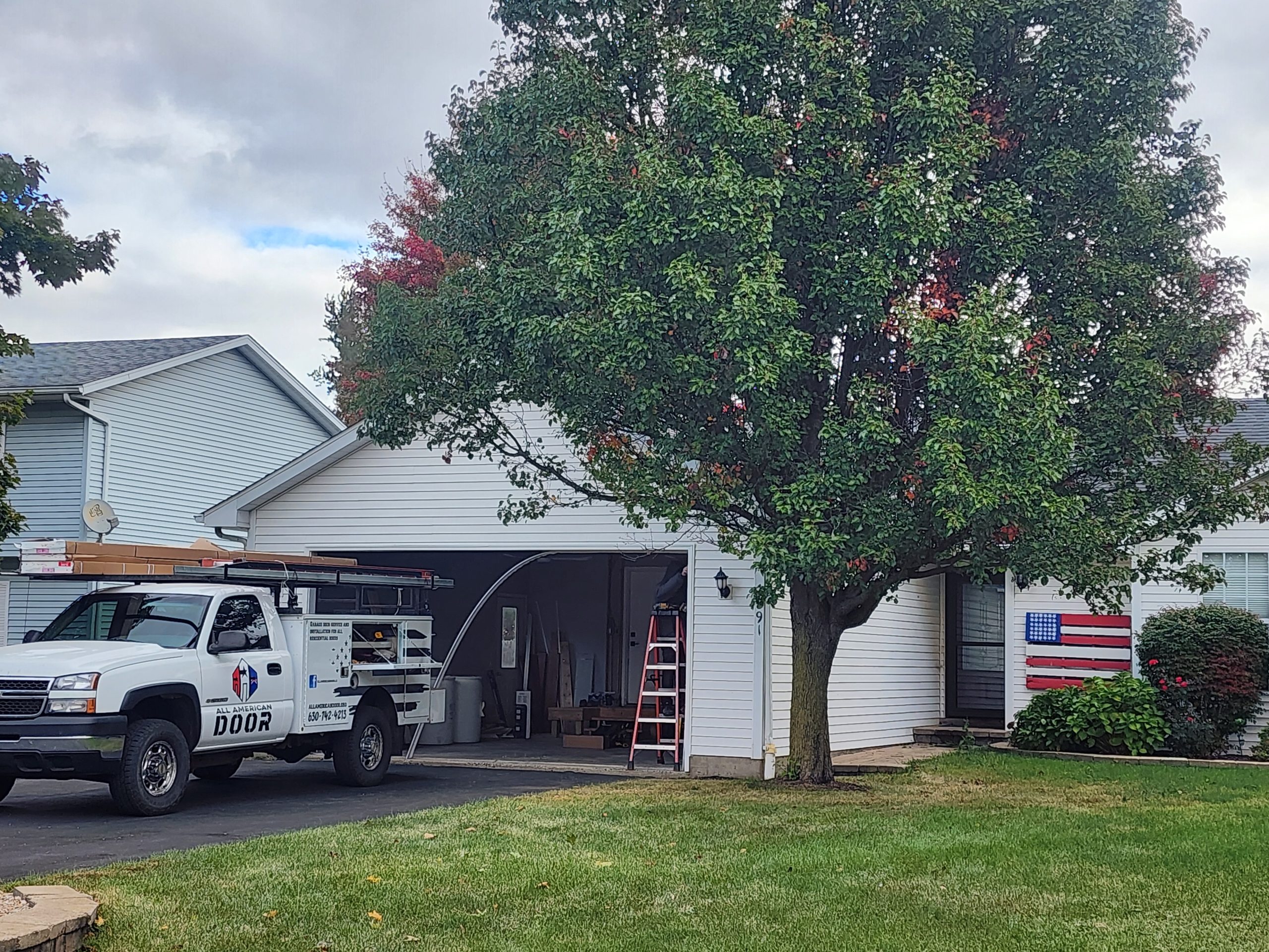 Man repairing a garage door